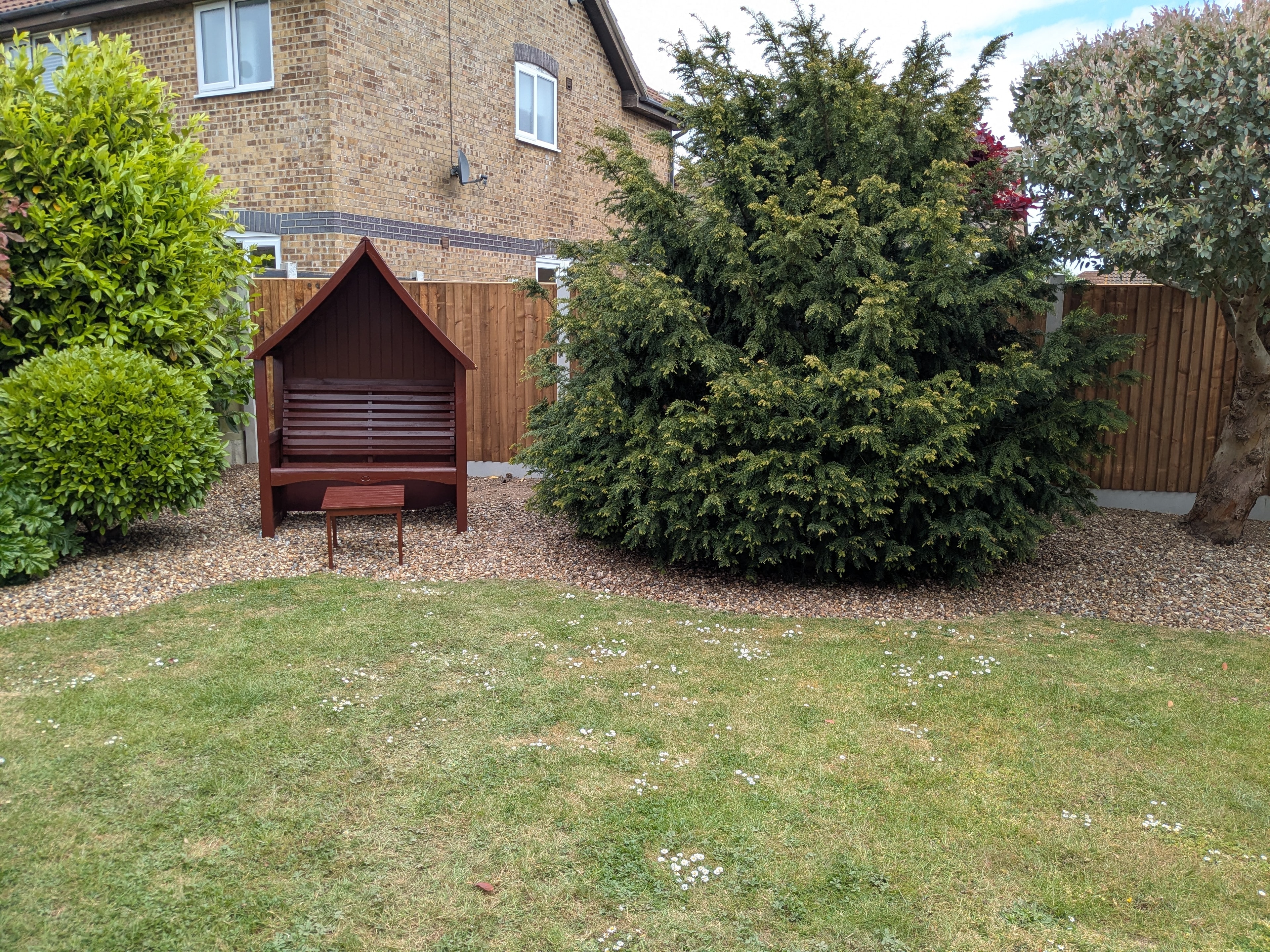 Garden landscaping with arbour and fencing