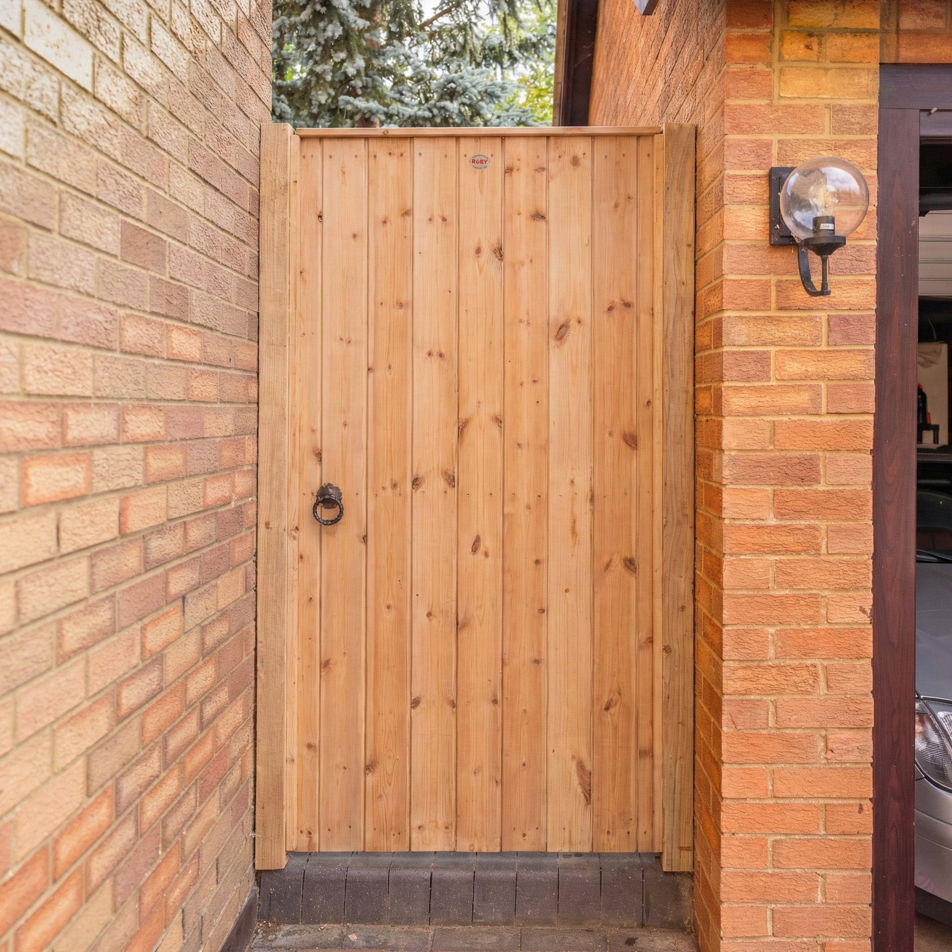 Wooden side gate installation